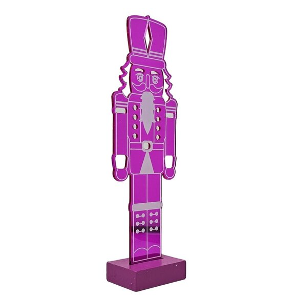 Violet Acrylic Christmas Nutcracker with Cut Outs to Shine Light Though - Picture 2 of 4